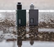Two vapes on the wet ground